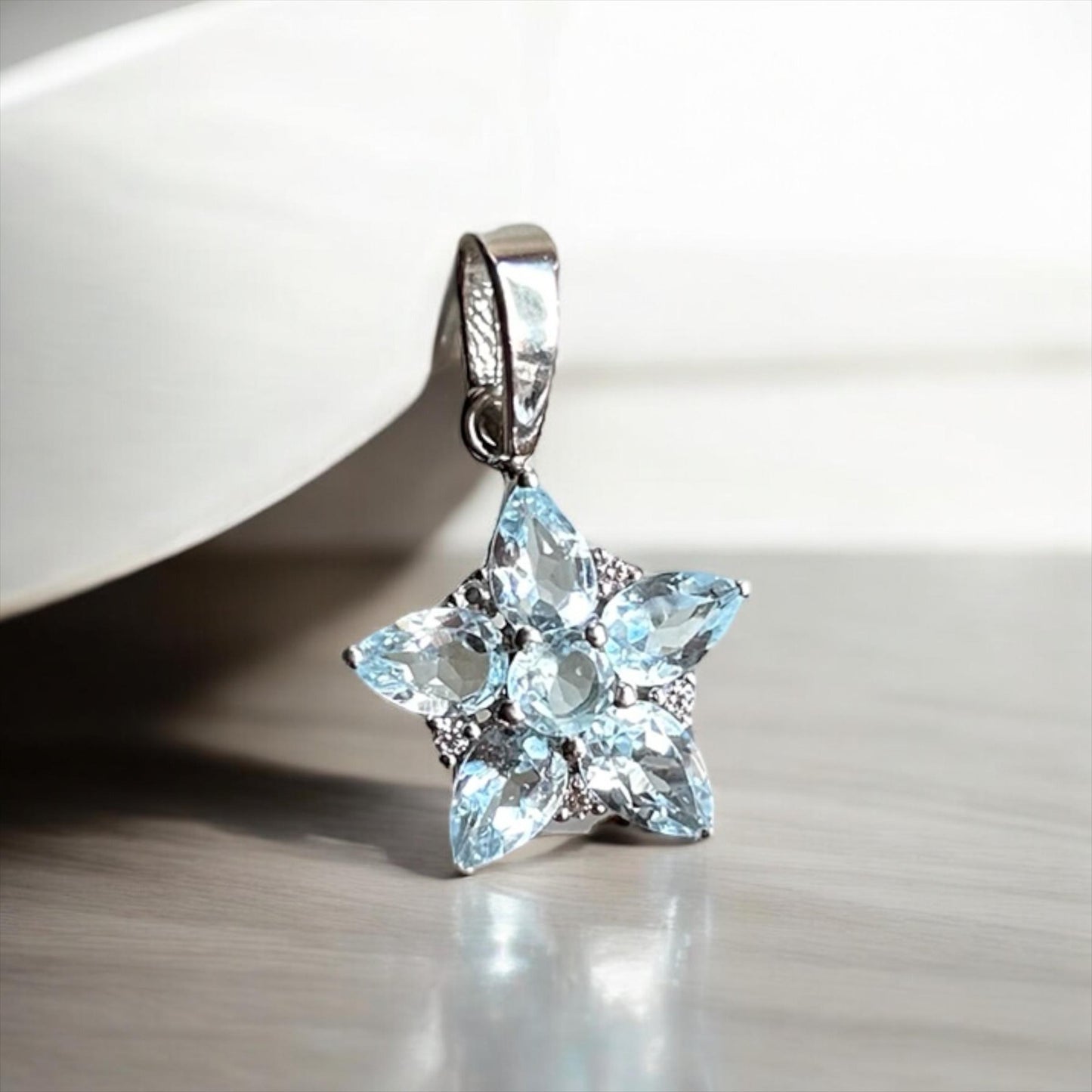 Sky Blue Topaz Star Pendant: 925 Sterling Silver
