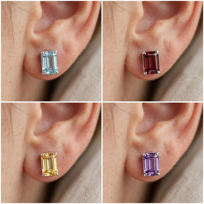 Four-panel close-up of an ear wearing rectangular stud earrings in different gemstone colors: light blue, dark red, yellow, and purple, all in silver-toned settings.