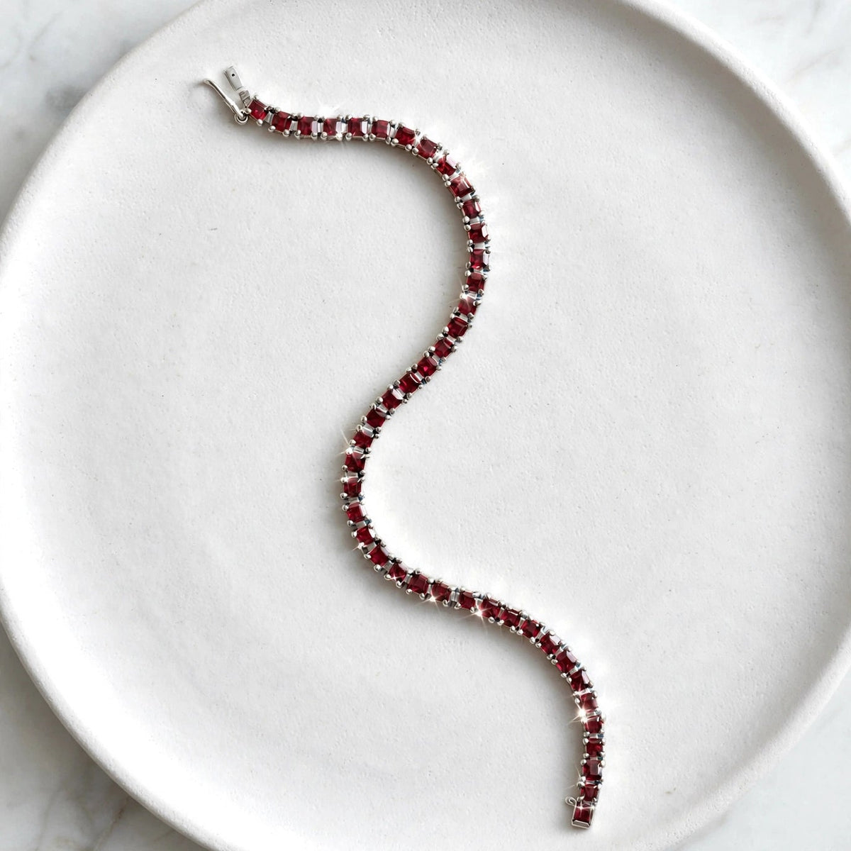 Natural red garnet tennis bracelet 925 sterling silver square cut January birthstone bracelet on white background"