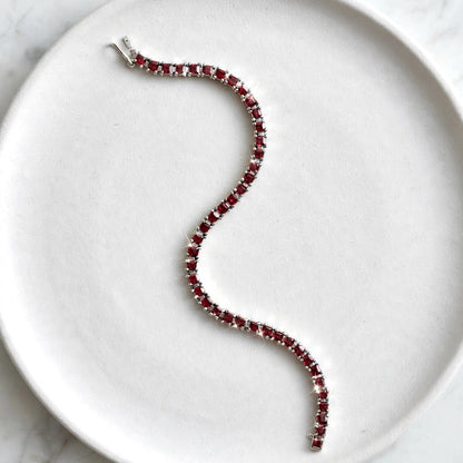 Natural red garnet tennis bracelet 925 sterling silver square cut January birthstone bracelet on white background"